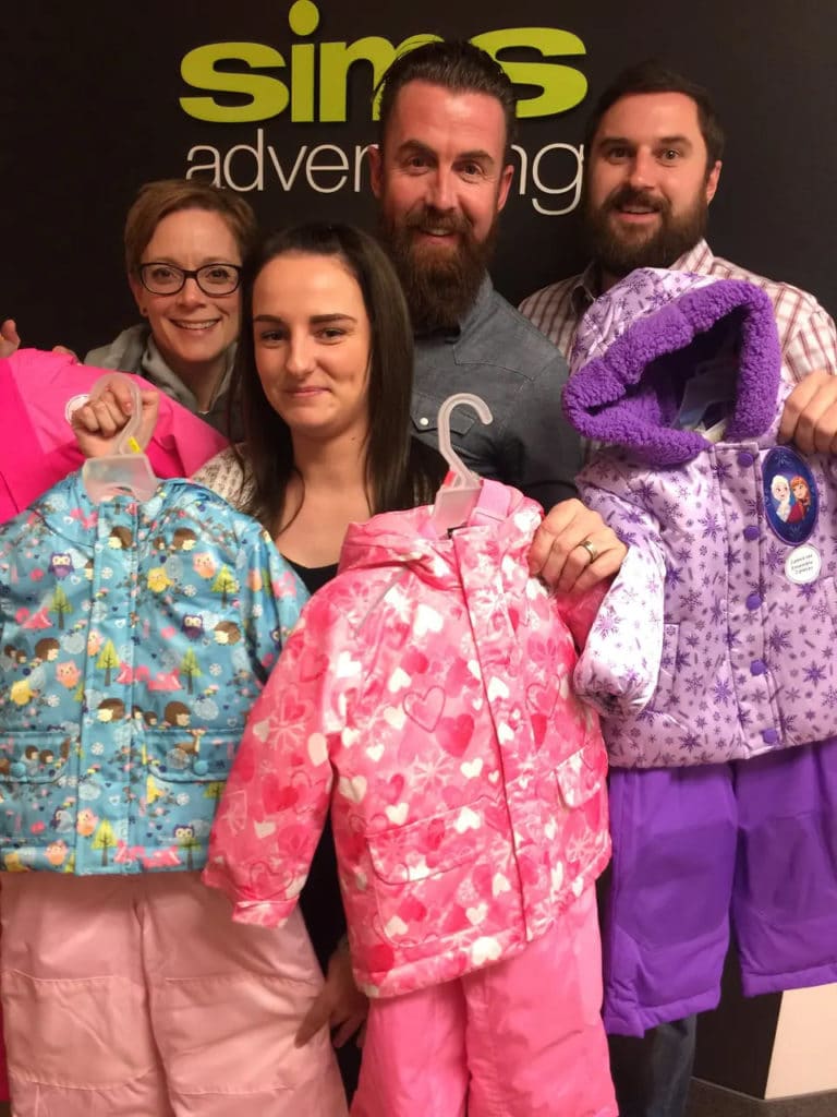 The Sims team collecting snowsuits for Children’s Aid Society of Hamilton The Sims team collecting snowsuits for Children's Aid Society of Hamilton
