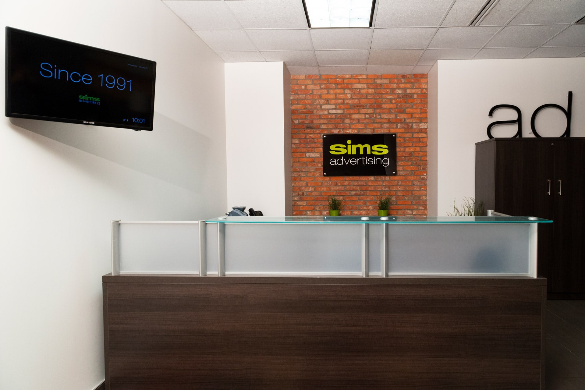 The reception desk at Sims Advertising
