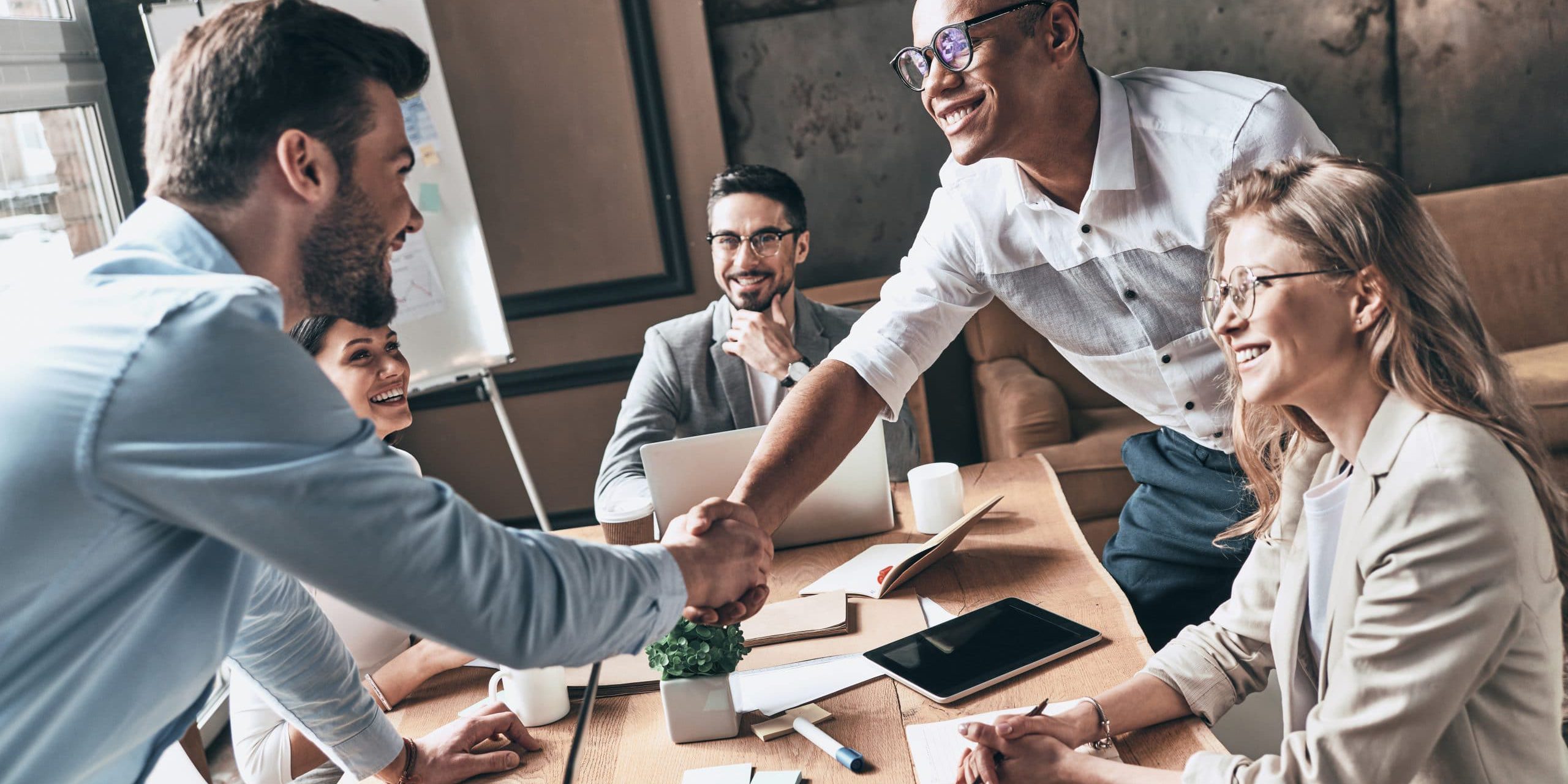Marketing Team marketing team shaking hands
